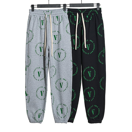 Full printed English alphabet elastic sports casual pants for men and women high street trousers